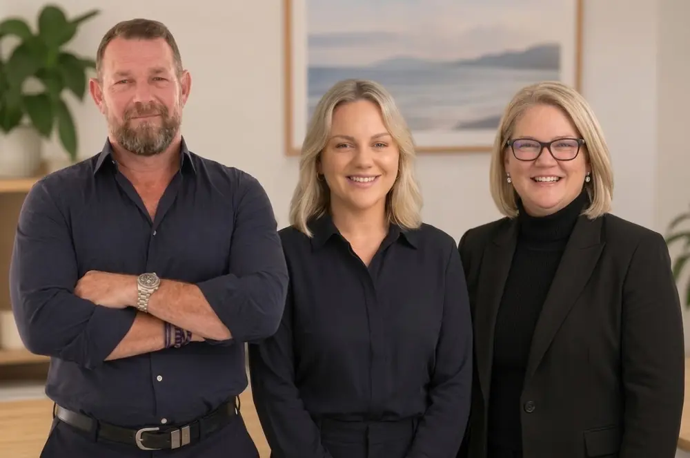 Blackadder Insurance Brokers team standing together indoors