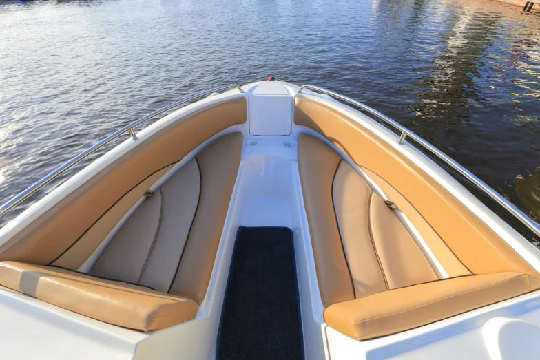 Bow seating of a recreational boat on the water — caravan and boat insurance